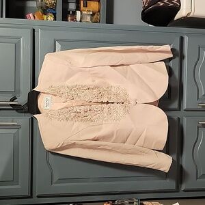 Like new stunning jacket with lace and faux diamonds. One button